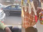 Africký pouličný pradavač predáva v premávke použité kondómy