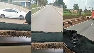 Šialenec sa pokúsil zastaviť nákladiak s osobným autom (cestná pomsta)