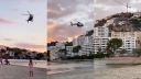 Turistov na malorskej pláži musia odháňať helikoptérou