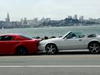 Dva Mustangy a Chevy Corvette