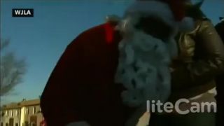 Postrelený Santa Claus