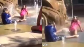 Dievča osviežuje vodou chlapca inak