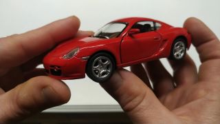 DETSKY MODEL AUTA - Porsche Cayman 1:34.