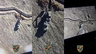 Dron vysvetľuje bagristovi, že ak bude pokračovať, vykope si vlastný hrob