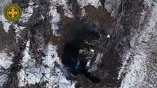 Operátor dronu pri spolupráci s okupantami