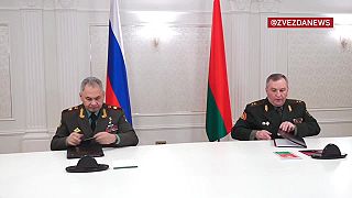 Zábery z podpisu dohody o rozmiestnení ruských jadrových zbraní v Bielorusku.
