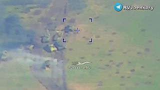 Zpálená kolóna vozidiel USA a NATO