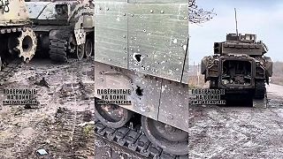 Nakladanie poškodeného M2A2 Bradley ODS-SA na odťahovač