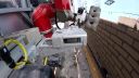 video SAM100 - robotický murár v akcii