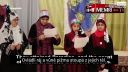 Americké děti ve Filadelfii zpívají o usekávání hlav a vraždách